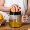 Manual Hand Squeezer Lime Press with Strainer Built-in Measuring Cup and Pitcher 500ml Citrus Lemon Orange Juicer - black